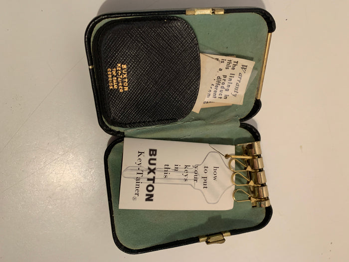 Black Hard Side Key-Tainer Key Case with Daisies circa 1970s