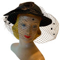 Noir Diva Black Bowler Style Hat with Dotted Netting, Bow and Feather circa 1960s